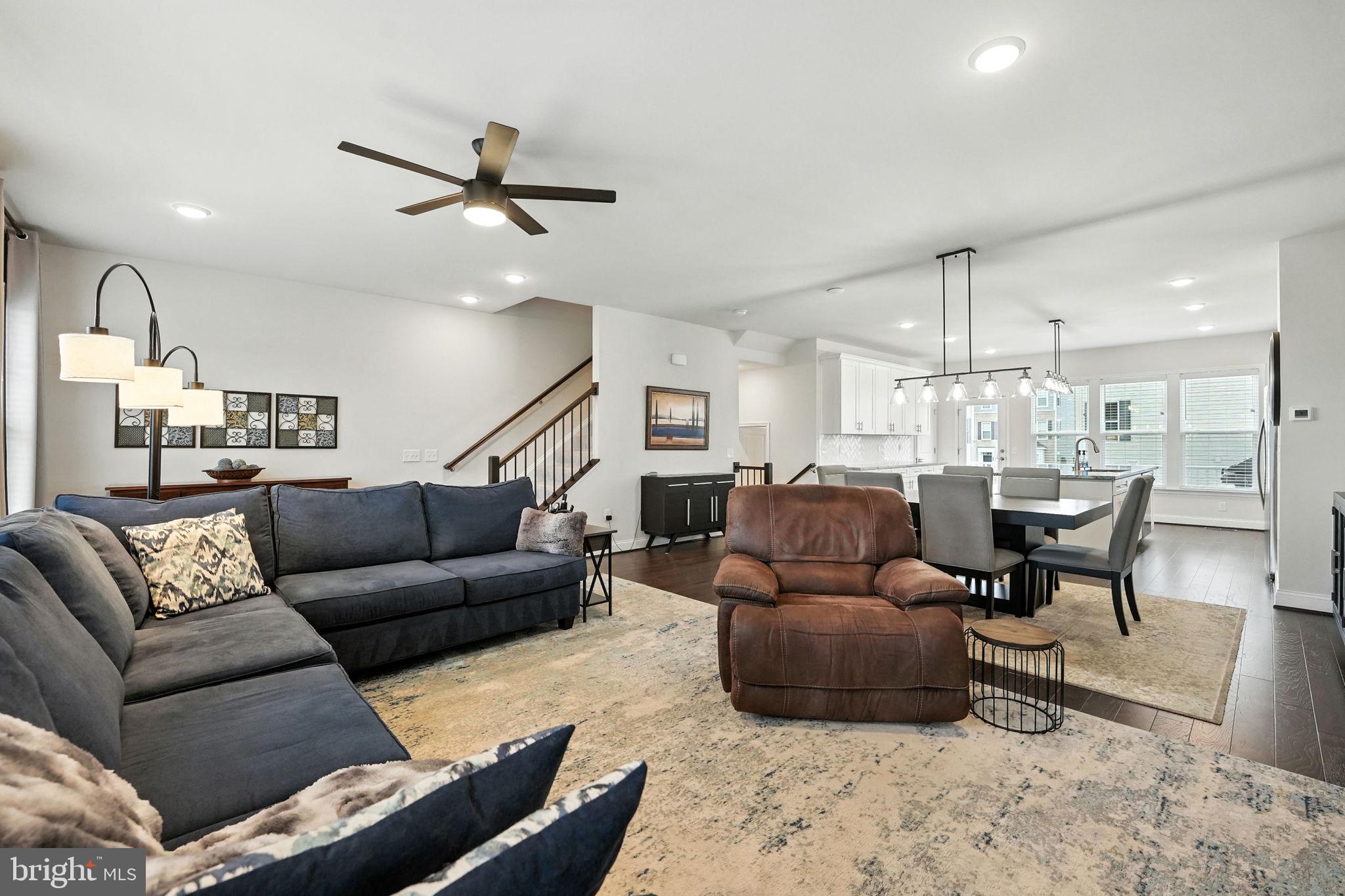 17233 Branched Oak Road Dumfries, VA 22026 - Photo 23 of 79 a living room with furniture and kitchen view
