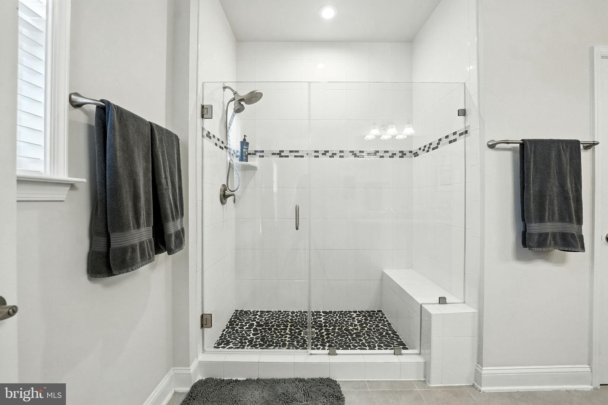 17233 Branched Oak Road Dumfries, VA 22026 - Photo 28 of 79 a bathroom with a shower toilet and sink