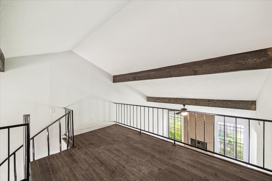 8628 Maplecrest Drive Houston, TX 77099 - Photo 7 of 10 a view of hallway with wooden floor