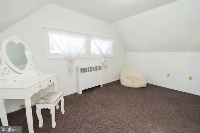 a room with furniture and window