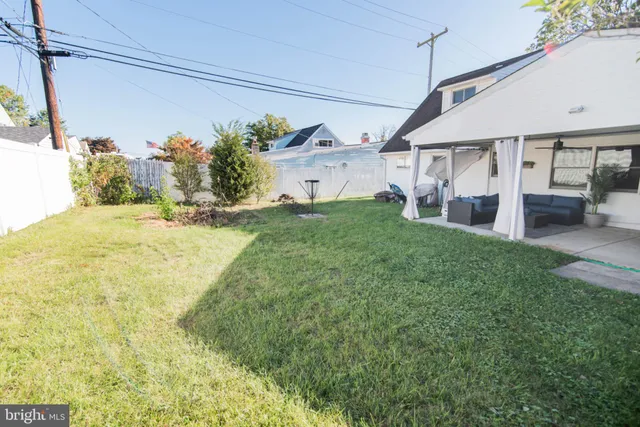 a view of a house with a big yard