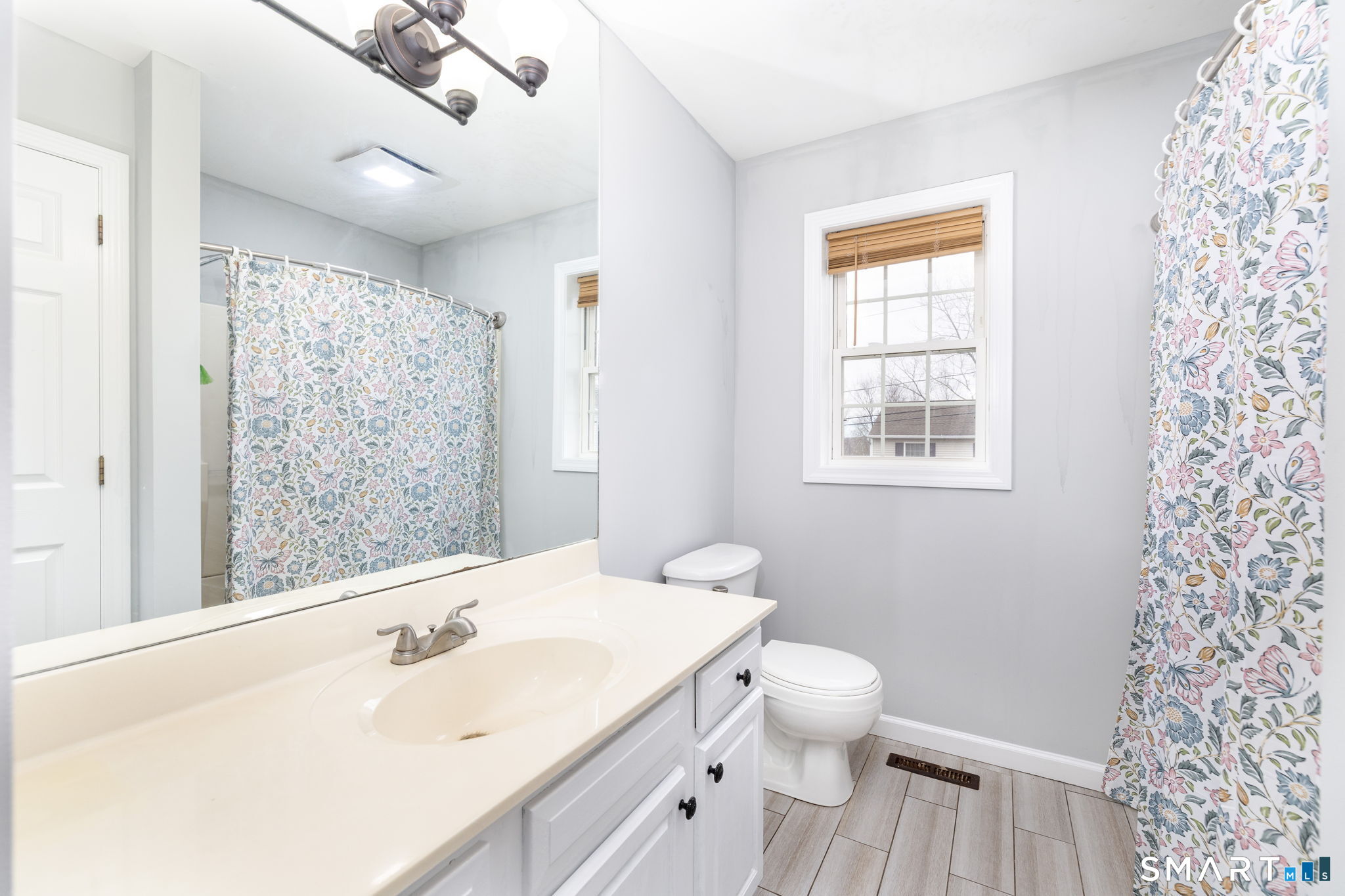 234 Traverse Street Waterbury, CT 06704 - Photo 14 of 38 a bathroom with a sink toilet and shower