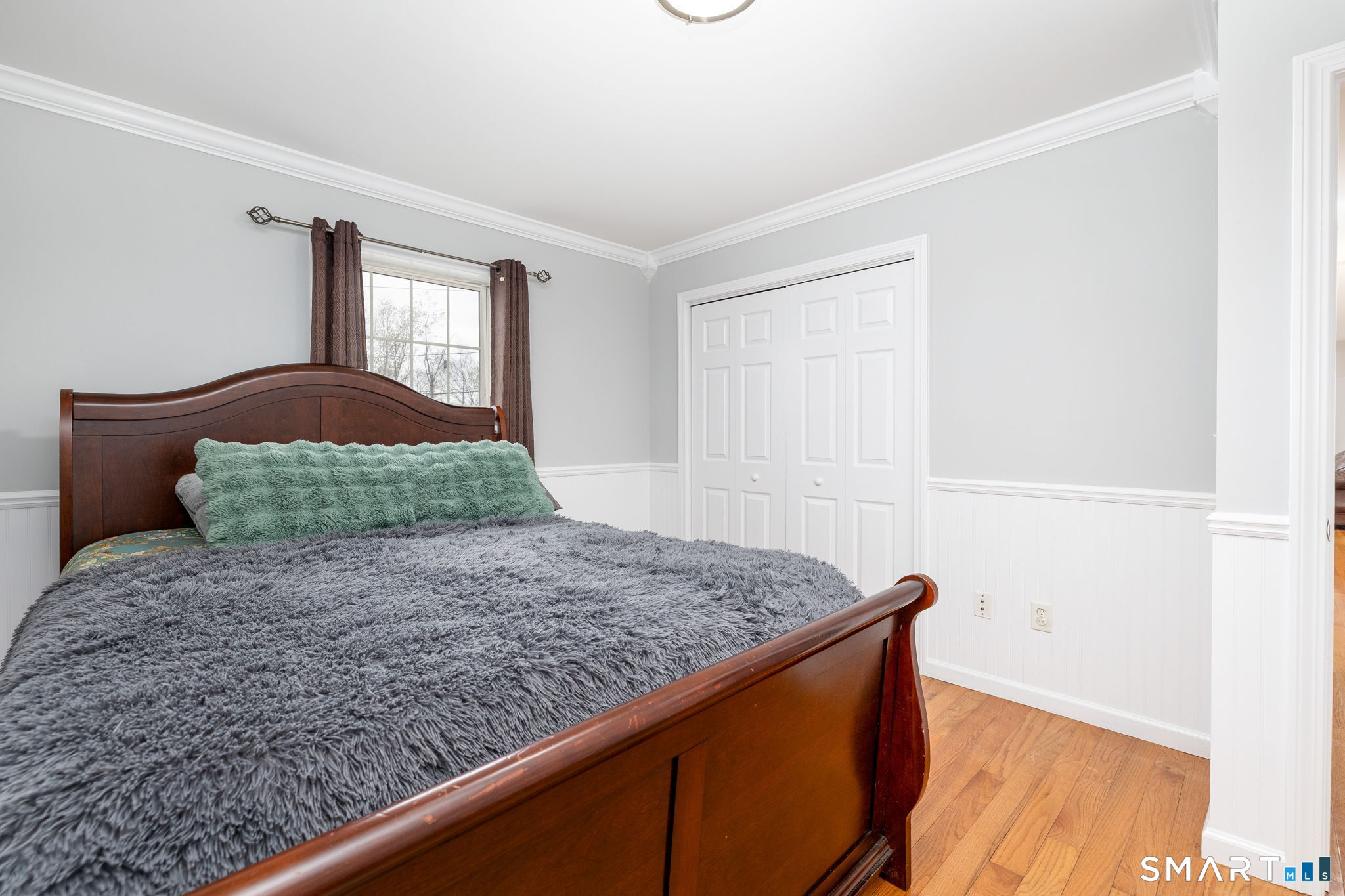234 Traverse Street Waterbury, CT 06704 - Photo 18 of 38 a bedroom with a bed and dresser