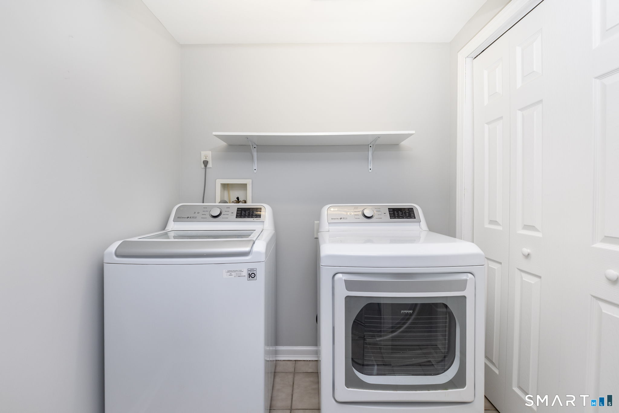 234 Traverse Street Waterbury, CT 06704 - Photo 23 of 38 a utility room with dryer and washer