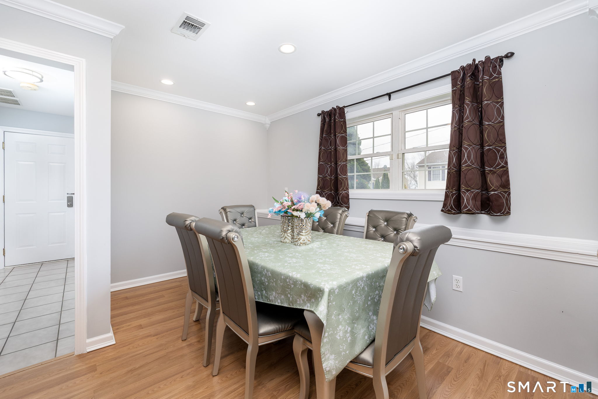234 Traverse Street Waterbury, CT 06704 - Photo 25 of 38 a view of a dining room with furniture and window