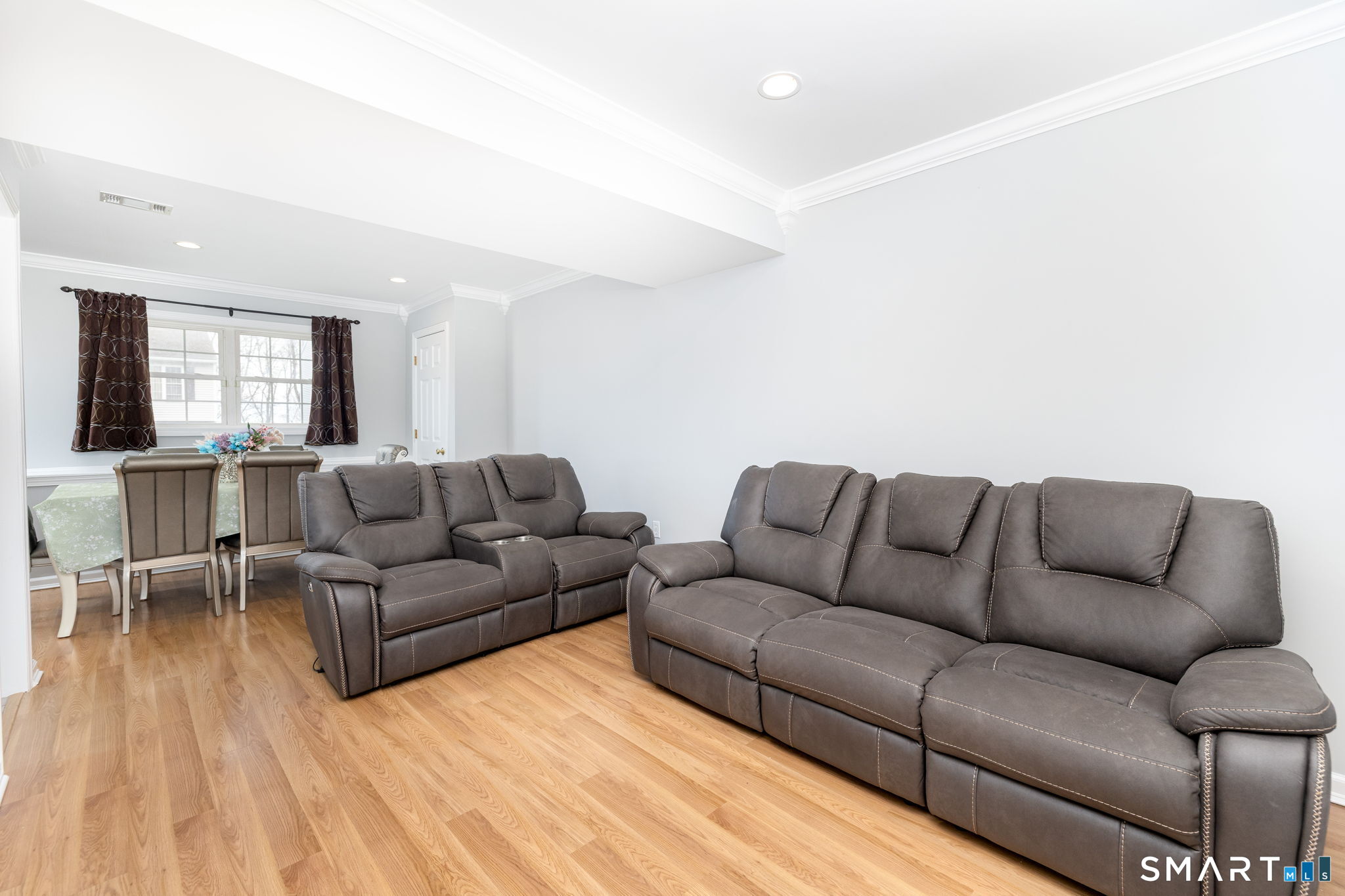 234 Traverse Street Waterbury, CT 06704 - Photo 26 of 38 a living room with furniture and a couch