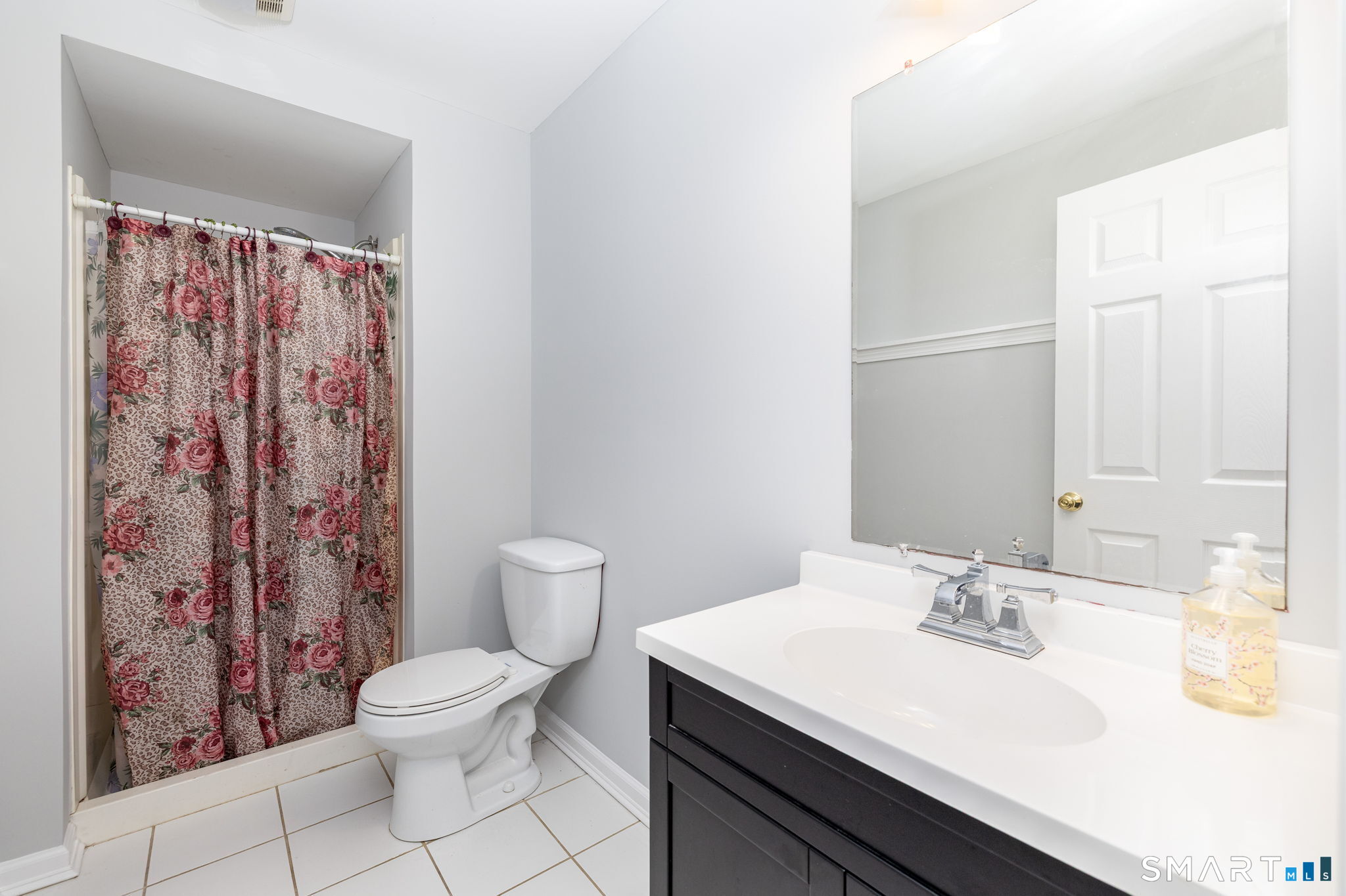 234 Traverse Street Waterbury, CT 06704 - Photo 27 of 38 a bathroom with a sink toilet and shower