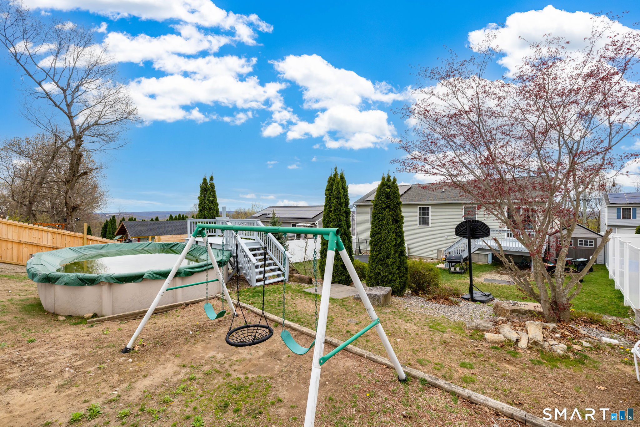 234 Traverse Street Waterbury, CT 06704 - Photo 35 of 38 a view of a backyard with sitting area