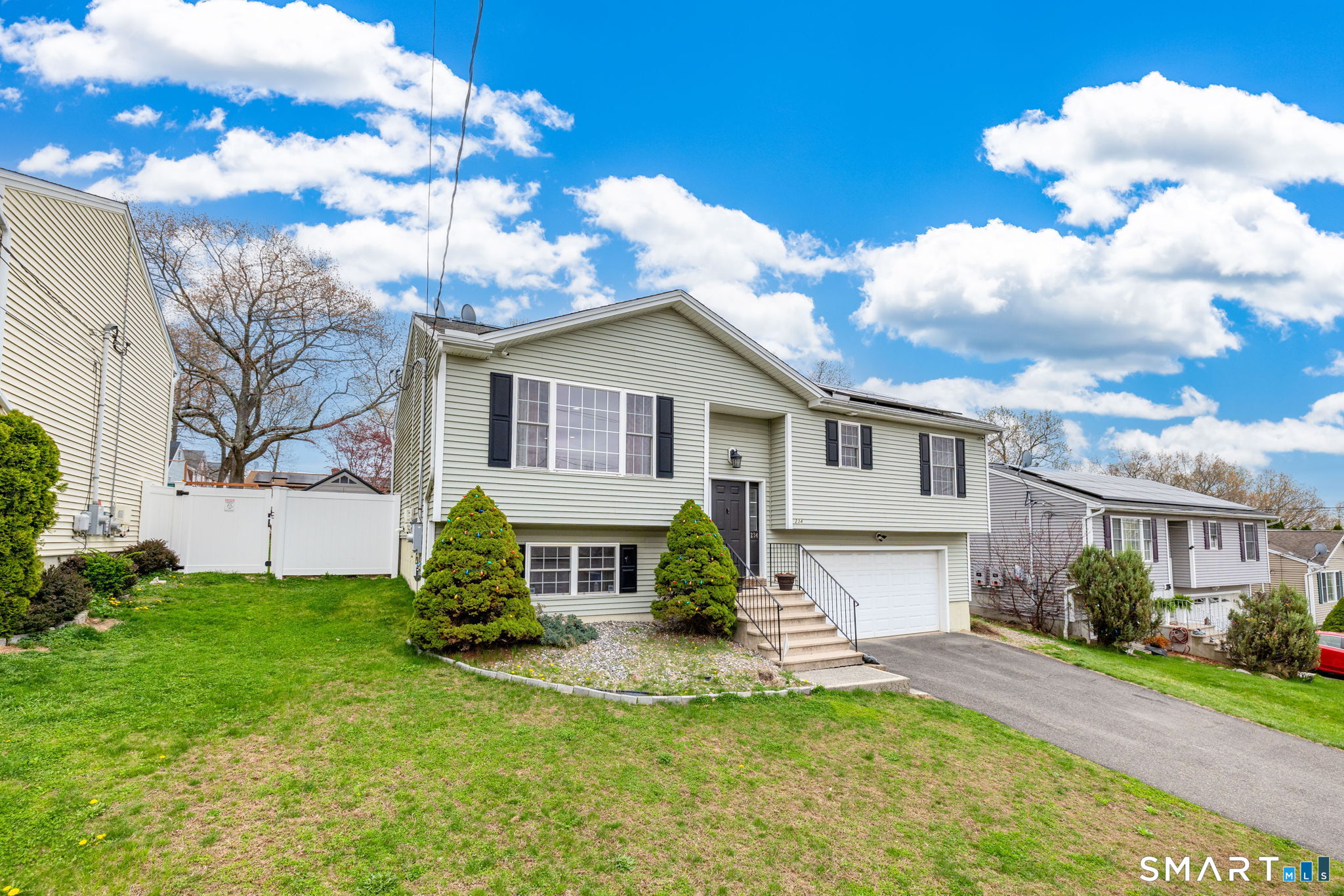234 Traverse Street Waterbury, CT 06704 - Photo 5 of 38 a view of a house with a yard
