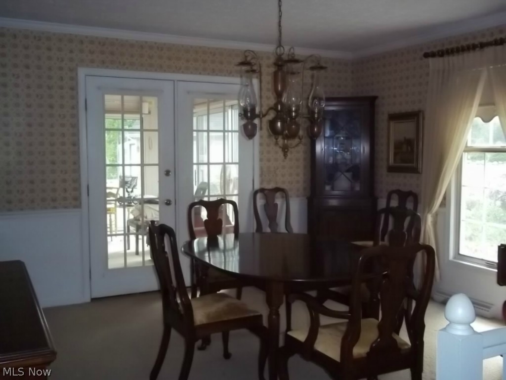 786 Stoner Road Clinton, OH 44216 - Photo 5 of 17 The formal dining room, French doors that lead to the enclosed sunroom
