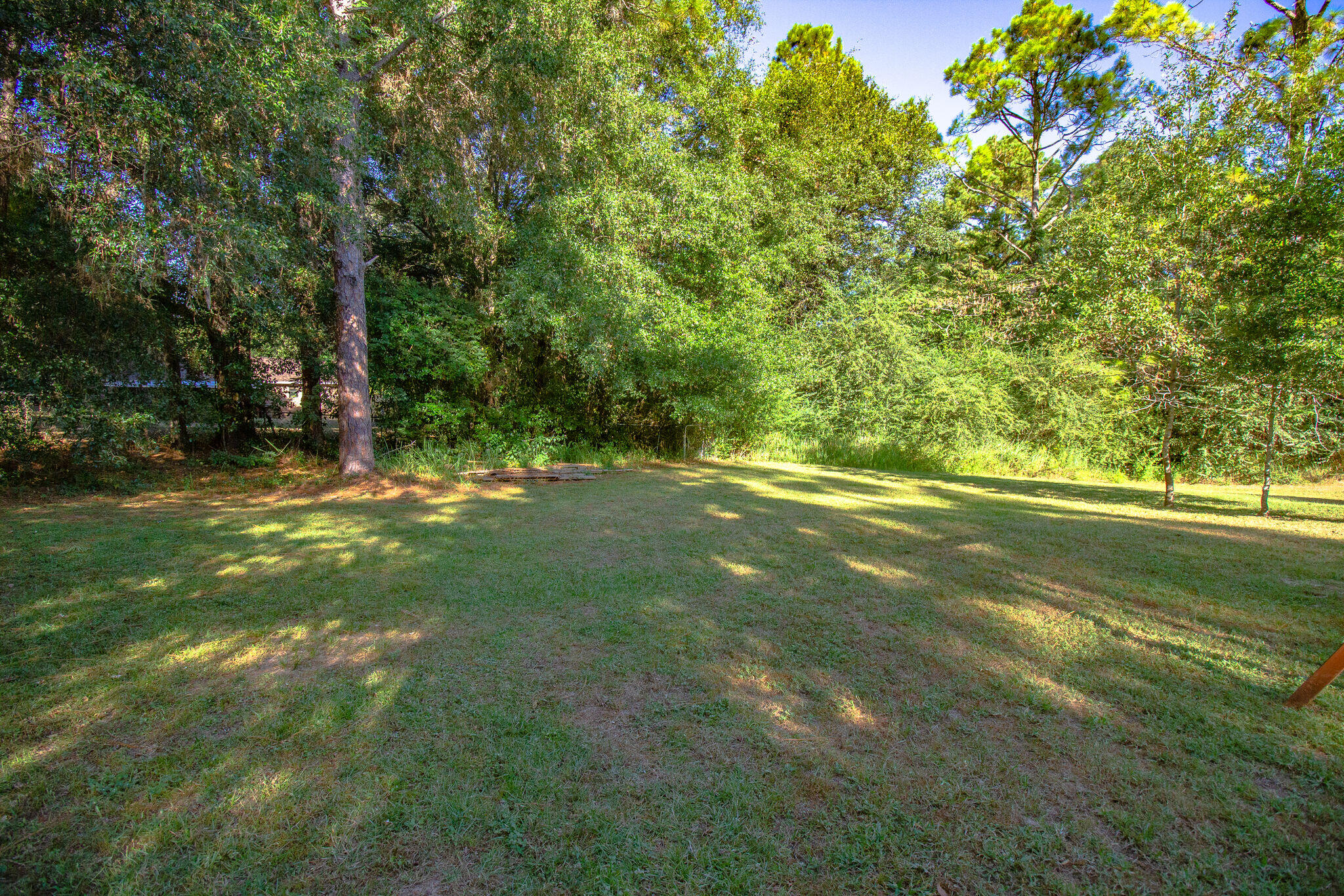 112 James Street Crestview, FL 32536 - Photo 15 of 16 a view of outdoor space with trees all around