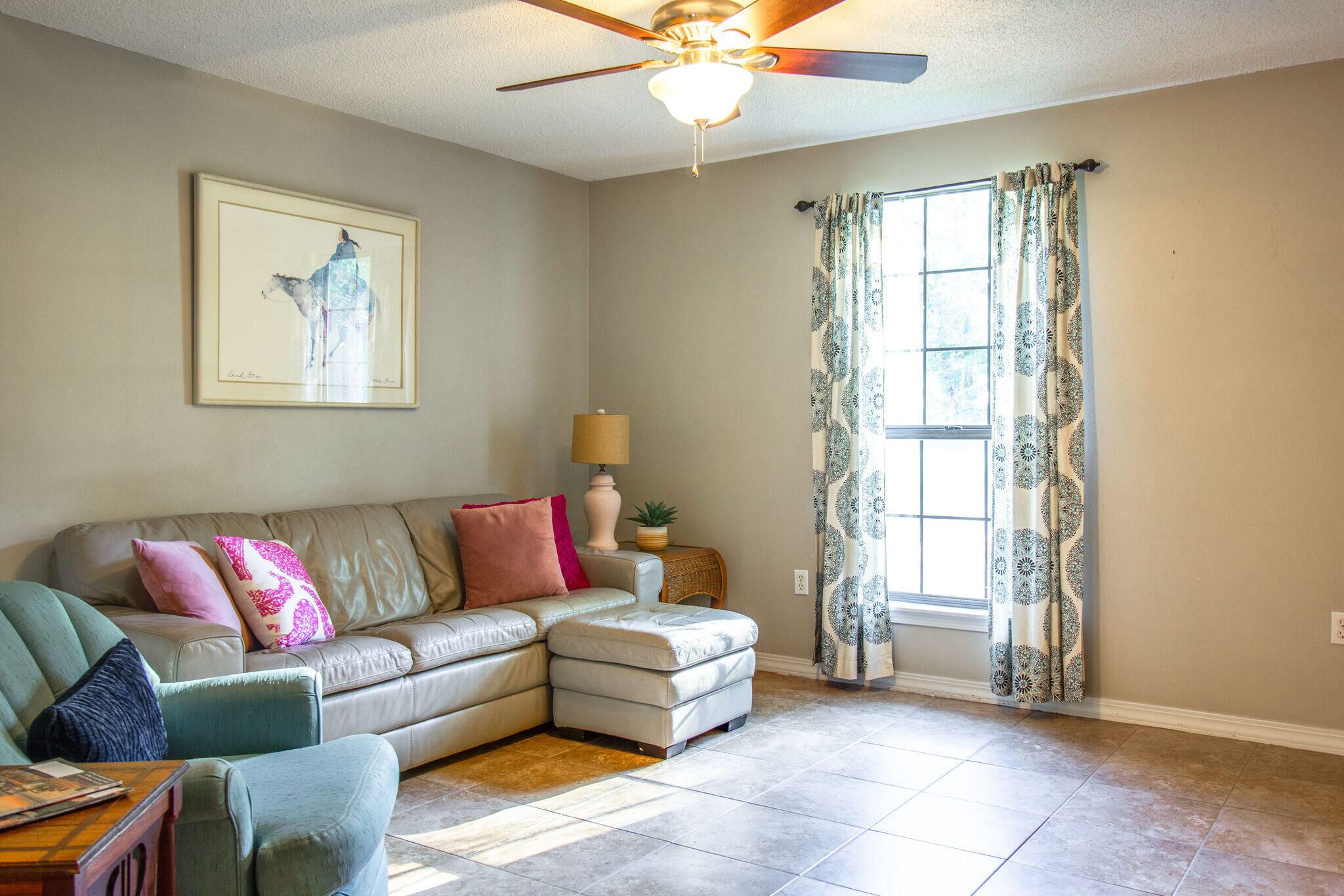 112 James Street Crestview, FL 32536 - Photo 6 of 16 a living room with furniture and a window