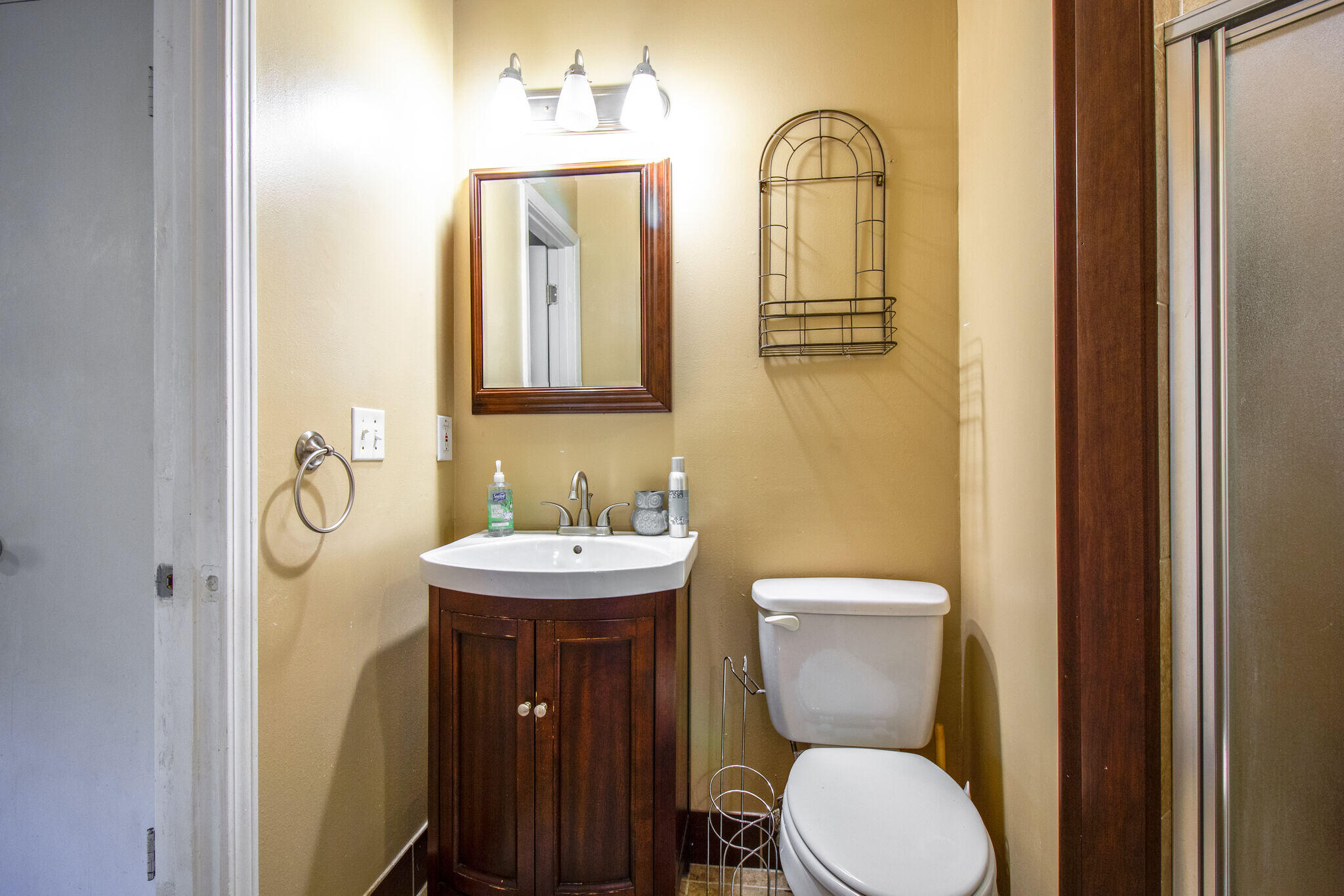 112 James Street Crestview, FL 32536 - Photo 10 of 16 a bathroom with a toilet a sink and mirror