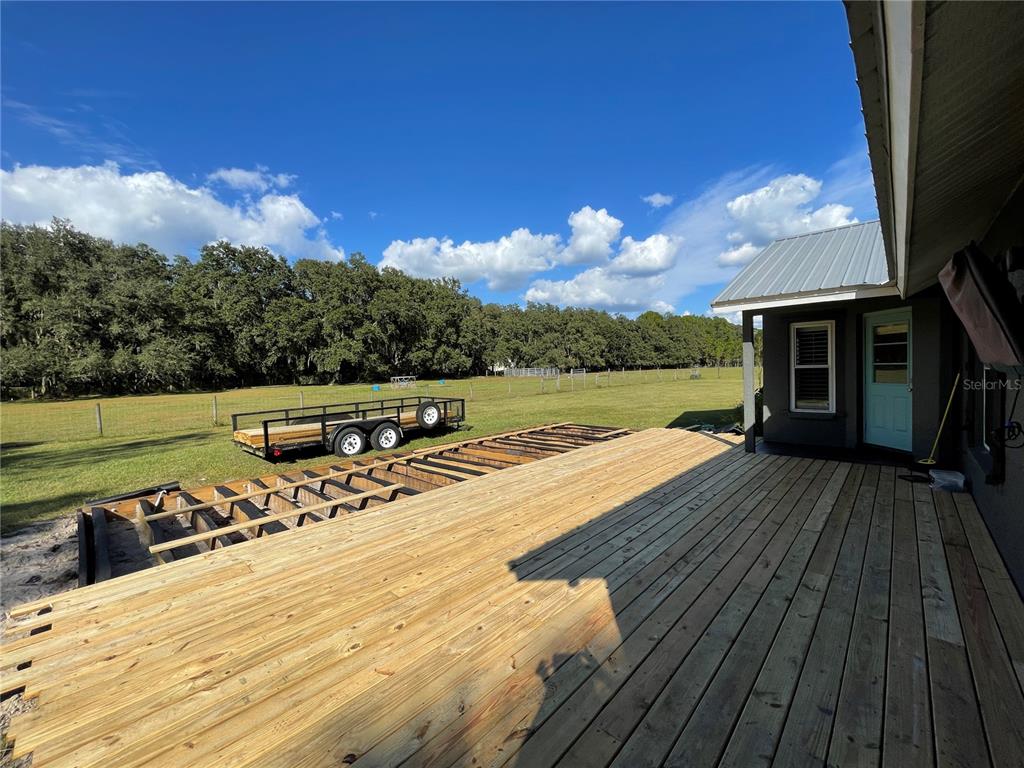 11956 Neal Road Lithia, FL 33547 - Photo 14 of 16 a view of swimming pool with lounge chair