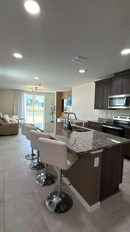 1445 Sea Glass Road Haines City, FL 33844 - Photo 5 of 21