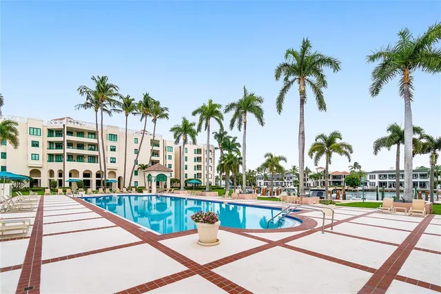 a view of swimming pool from a balcony