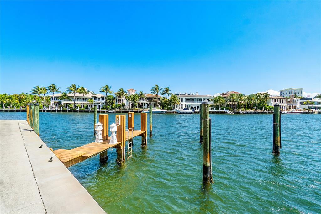 100 Southeast 5th Avenue, Unit 110 Boca Raton, FL 33432 - Photo 44 of 52 a view of a lake with boats and trees in the background