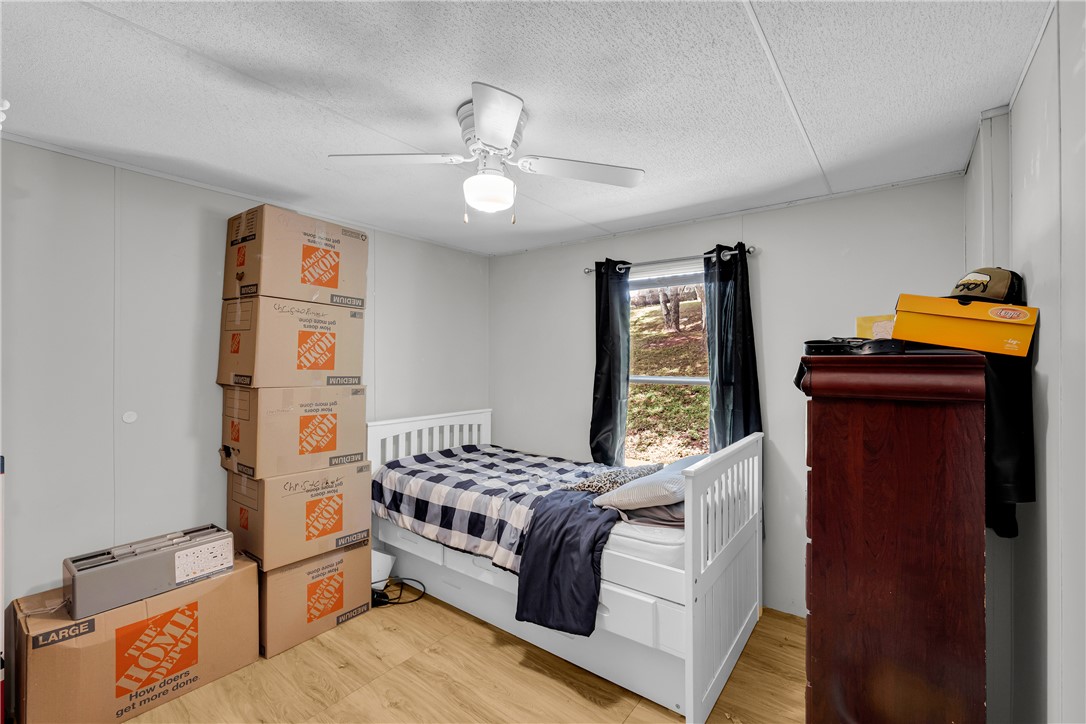 162 Newberry Road Walhalla, SC 29691 - Photo 24 of 50 A restful bedroom offers comfort and a tranquil view of nature.