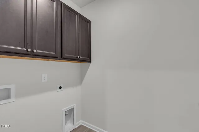 a view of a balcony with a ceiling fan and a window