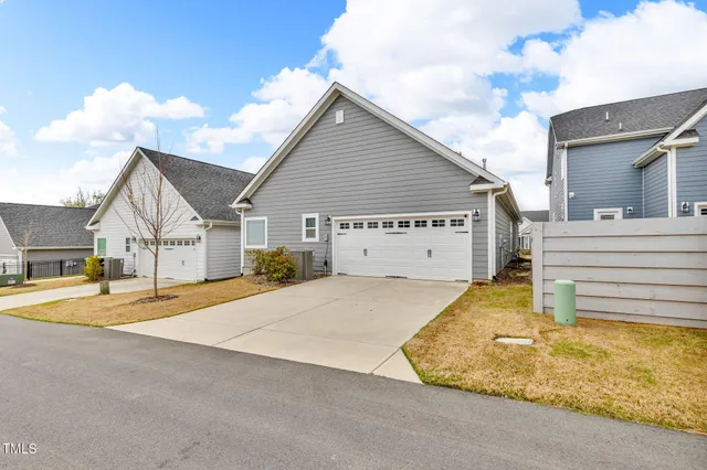 a view of garage and yard