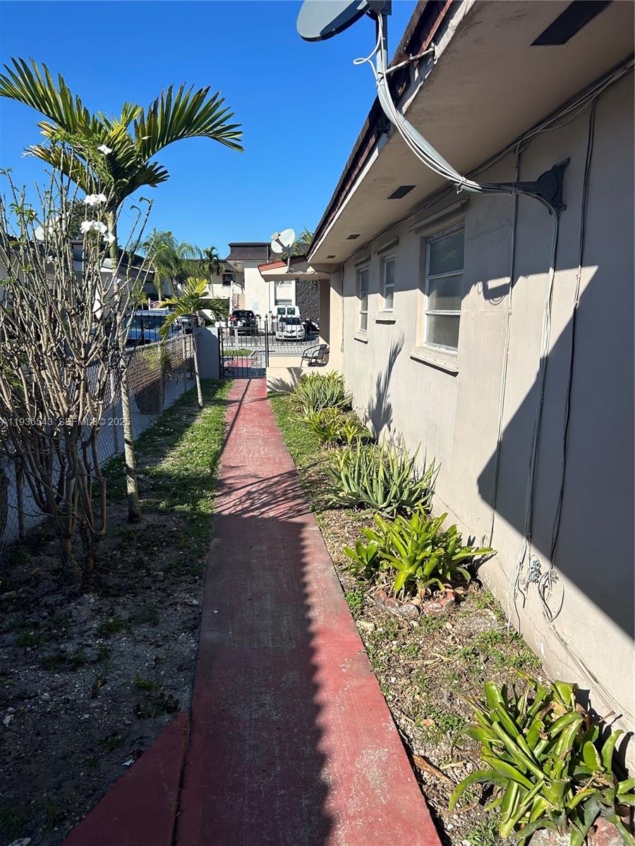 442 East 29th Street, Unit 442 Hialeah, FL 33013 - Photo 23 of 23 a view of a backyard with plants