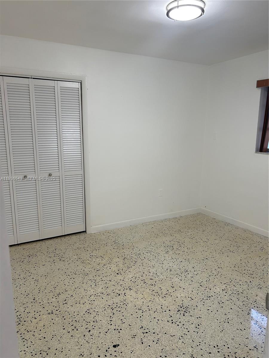 442 East 29th Street, Unit 442 Hialeah, FL 33013 - Photo 7 of 23 a view of an empty room