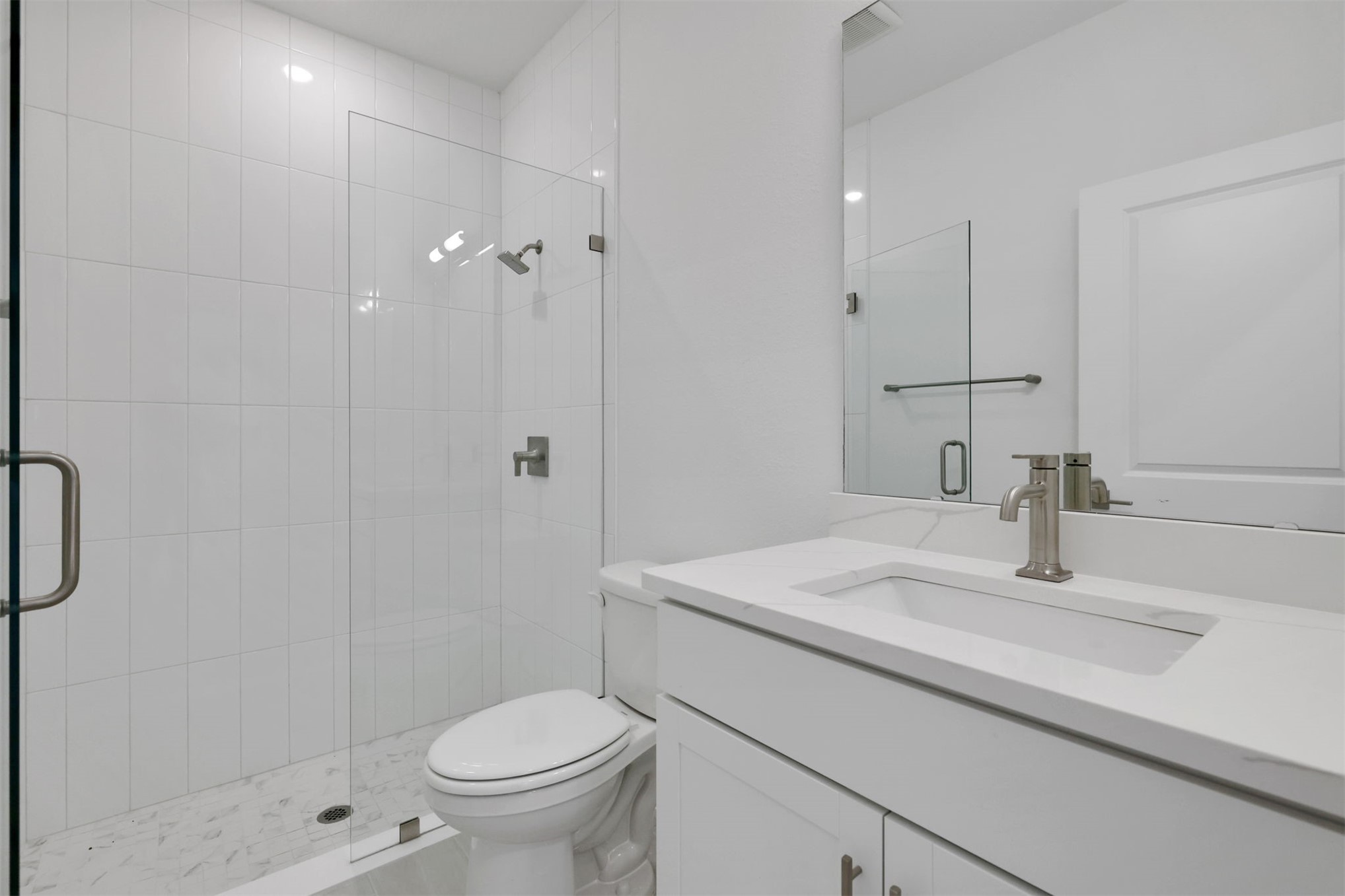 96040 Pirates Bluff Road Yulee, FL 32097 - Photo 23 of 38 a bathroom with a sink toilet and shower
