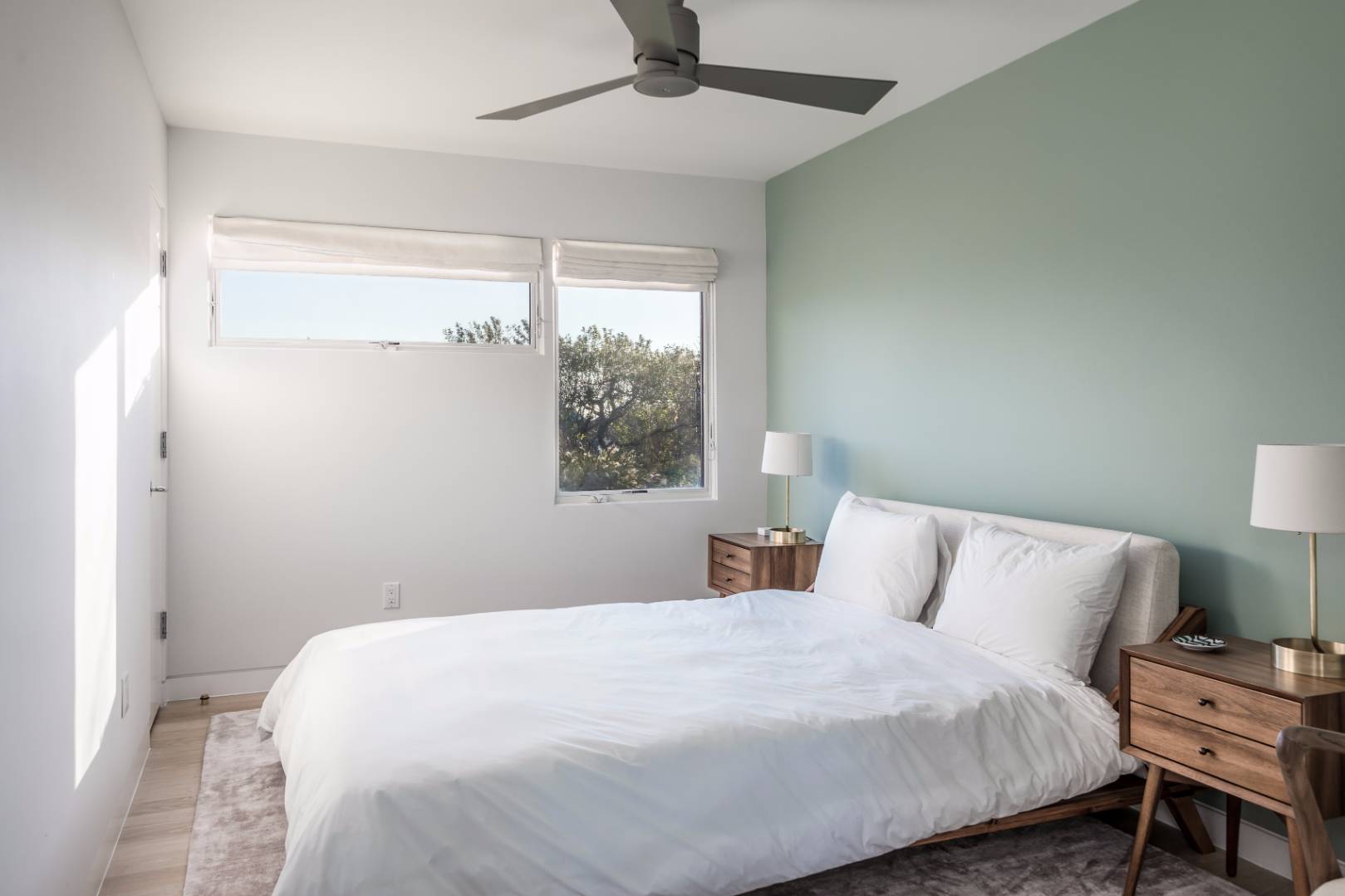 83 North Surfside Avenue Montauk, NY 11954 - Photo 12 of 26 a bedroom with a bed and a window