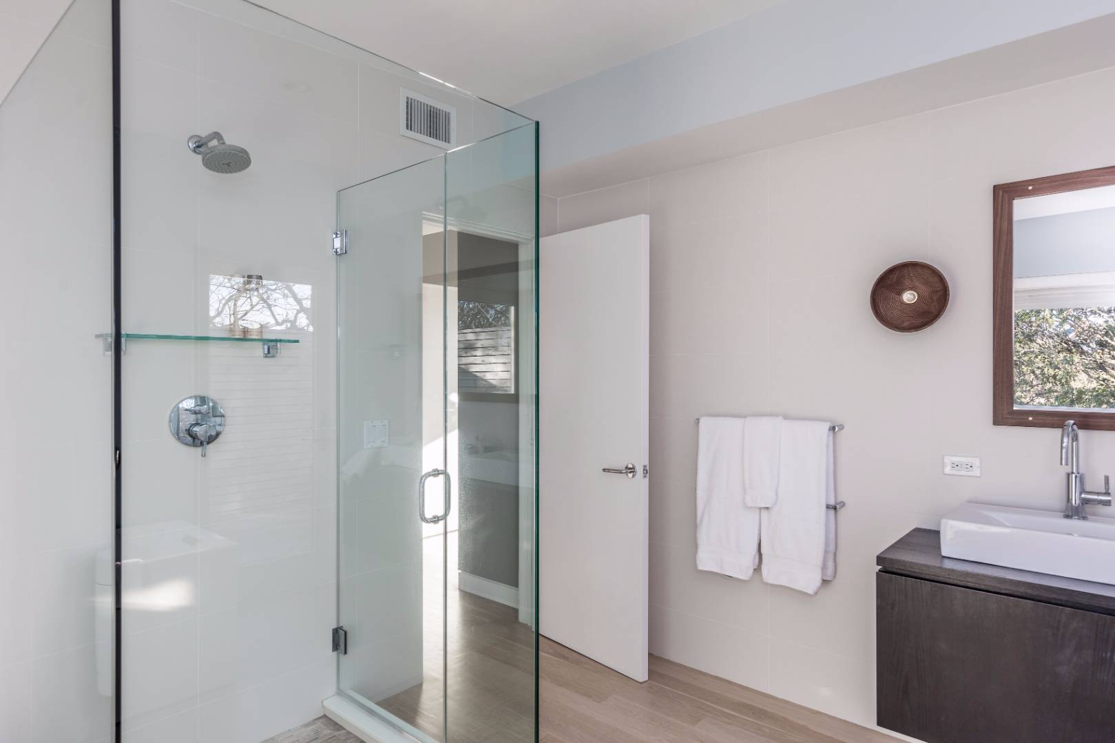 83 North Surfside Avenue Montauk, NY 11954 - Photo 18 of 26 a bathroom with a sink and a mirror