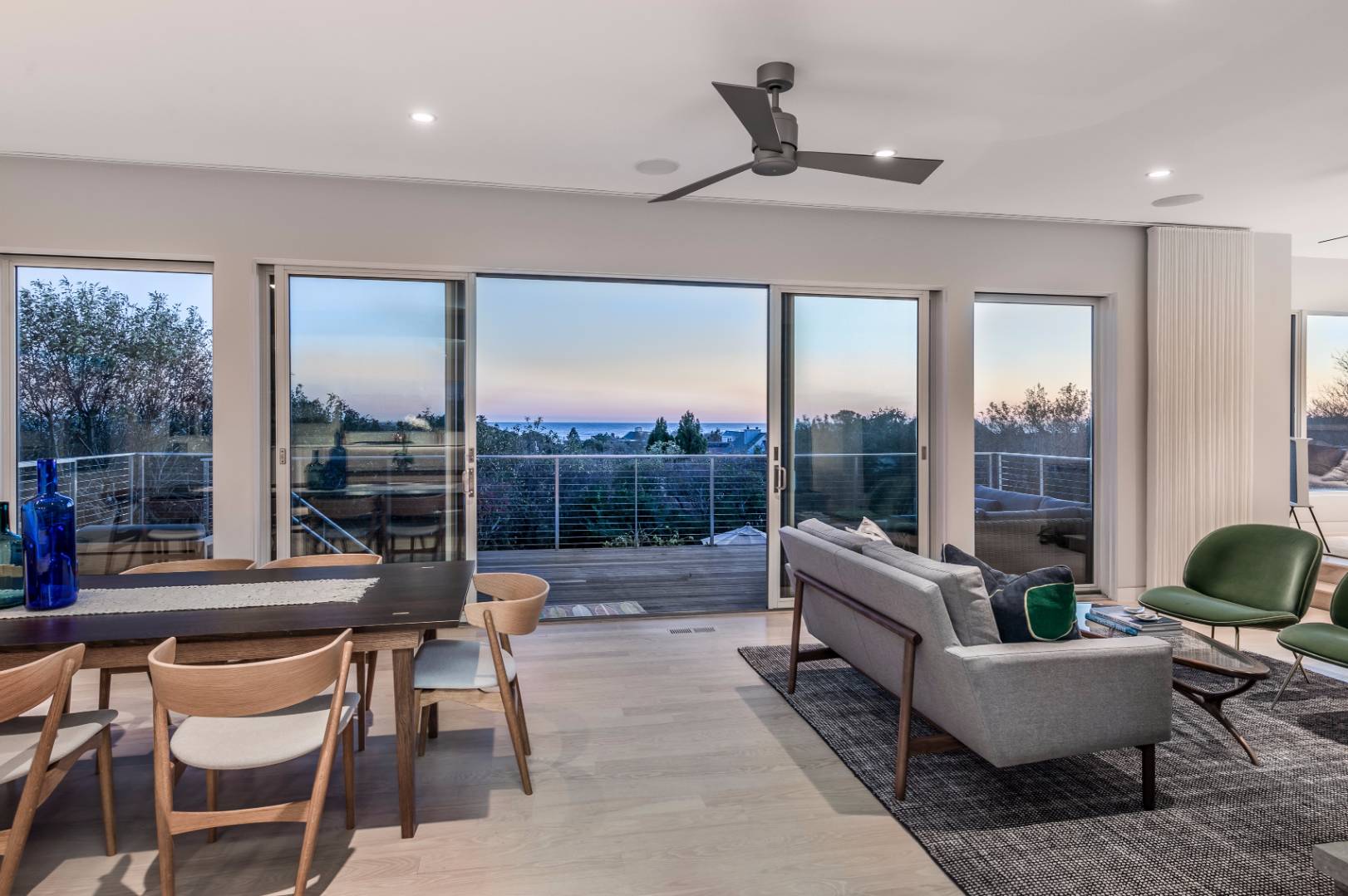 83 North Surfside Avenue Montauk, NY 11954 - Photo 7 of 26 a living room with furniture and a large window