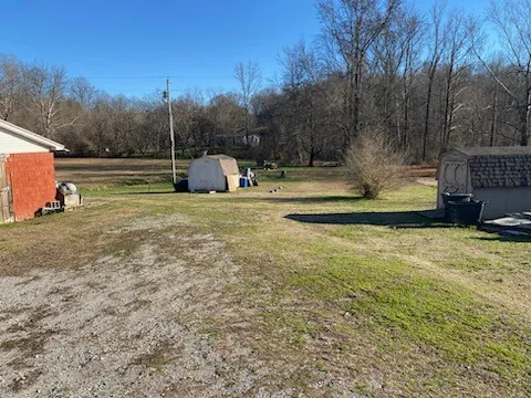 a view of a garden with basketball court