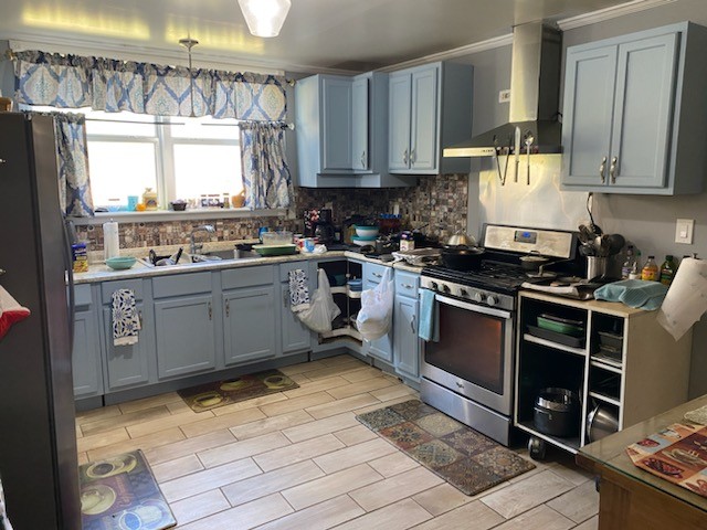 2705 Johnson Branch Road Leoma, TN 38468 - Photo 5 of 16 a kitchen with a stove a sink and a refrigerator