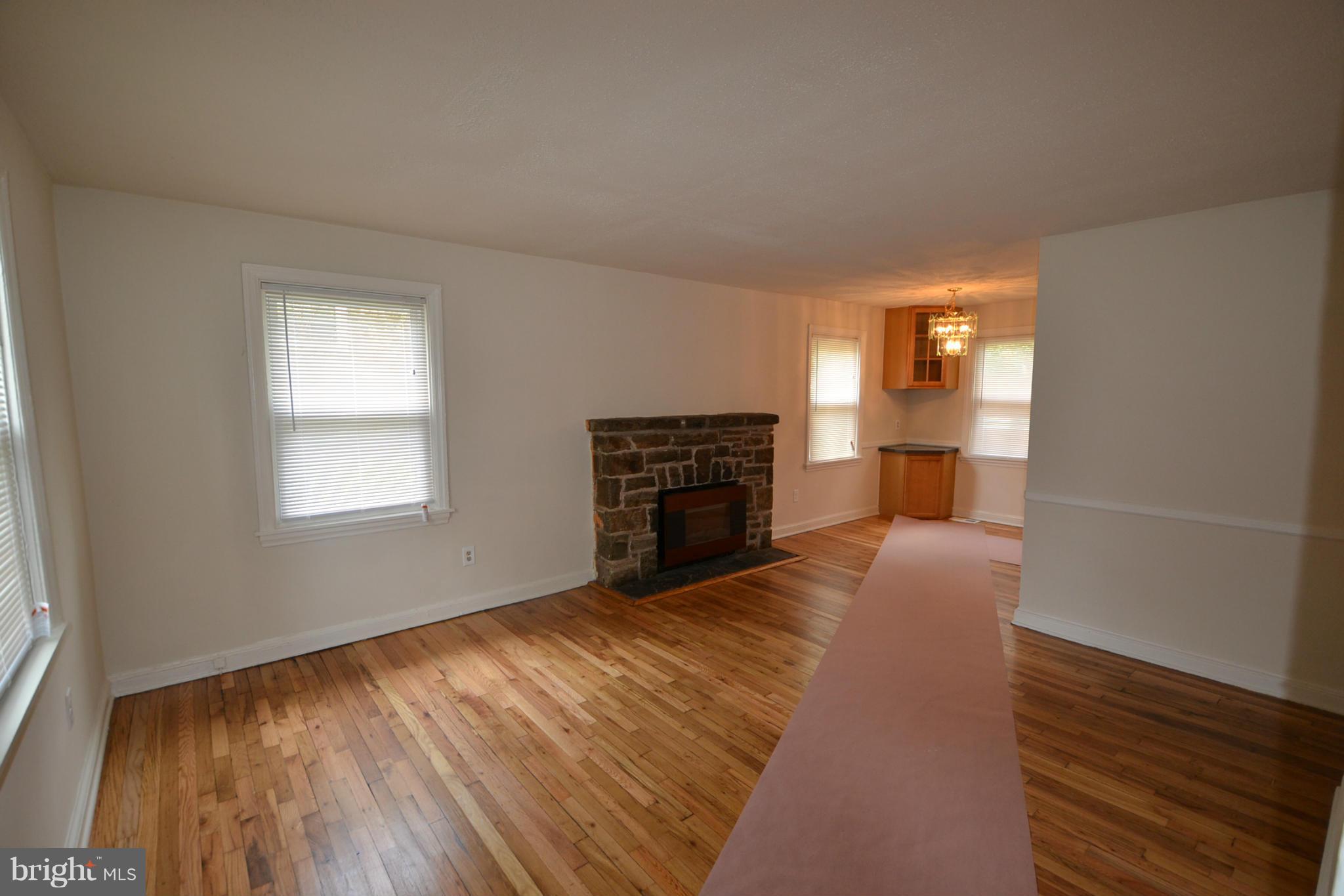 2504 Steele Road Baltimore, MD 21209 - Photo 2 of 21 a view of a livingroom with a fireplace