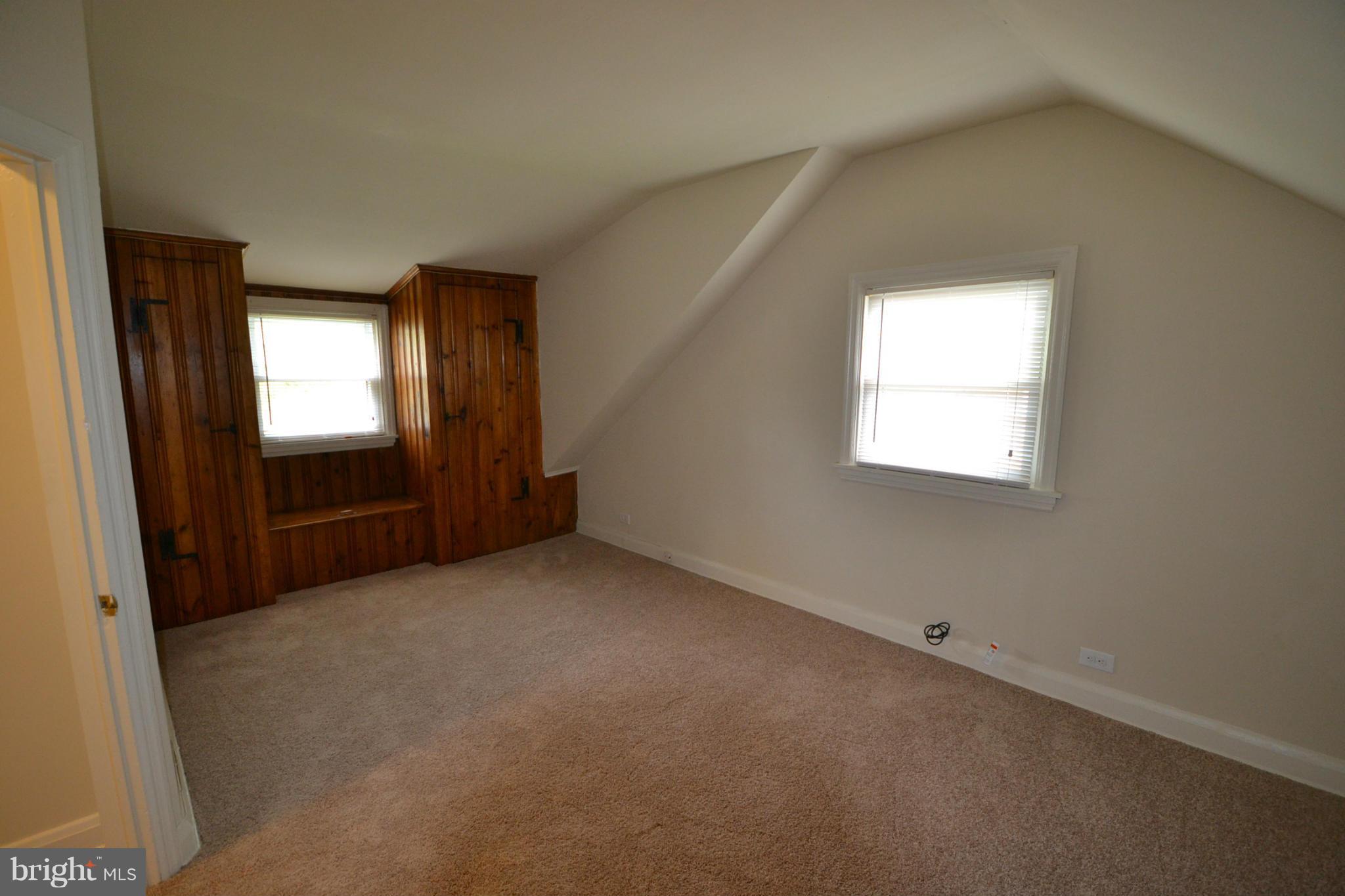 2504 Steele Road Baltimore, MD 21209 - Photo 15 of 21 an empty room with windows