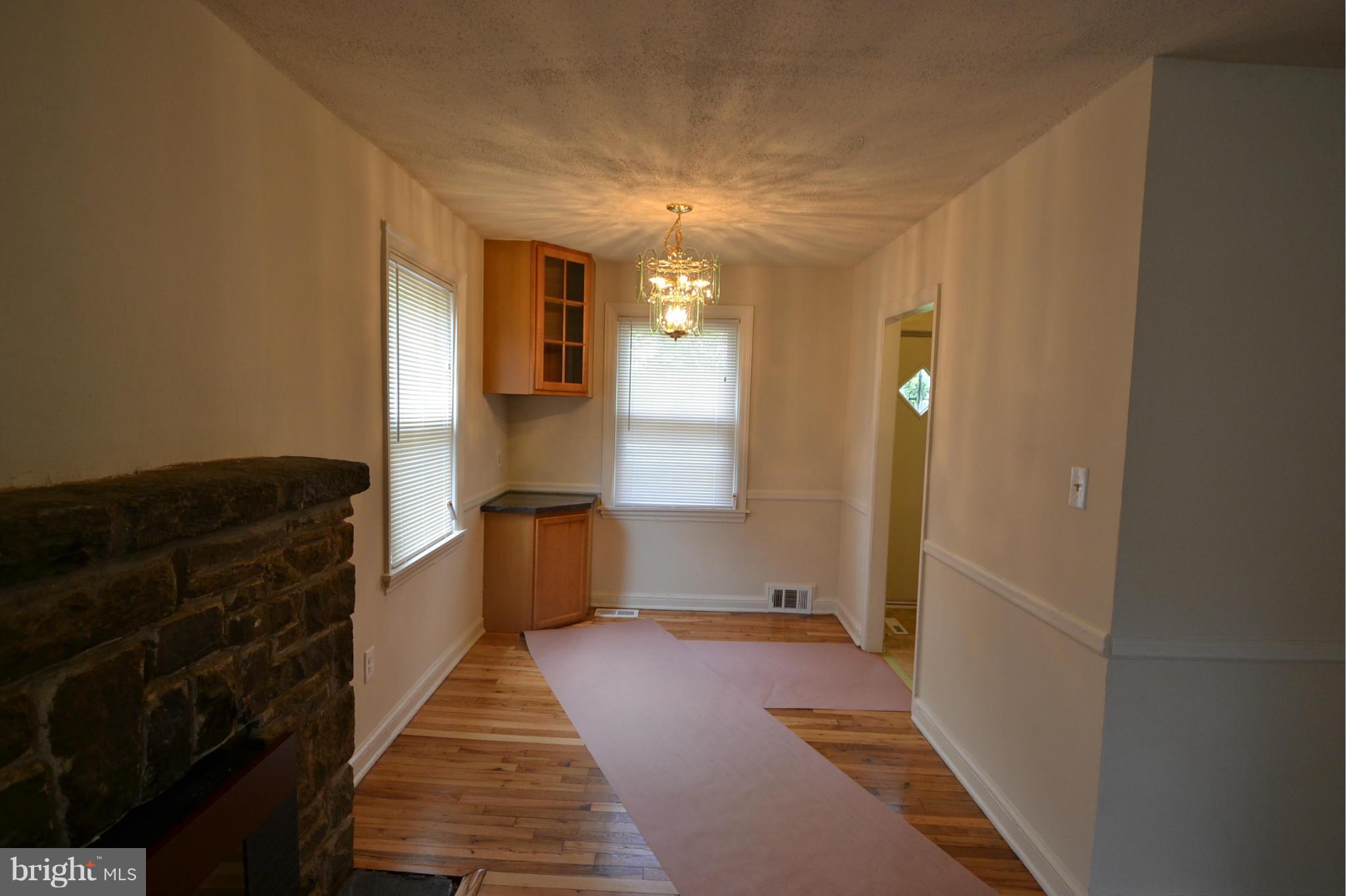 2504 Steele Road Baltimore, MD 21209 - Photo 6 of 21 a view of a hallway with a furniture