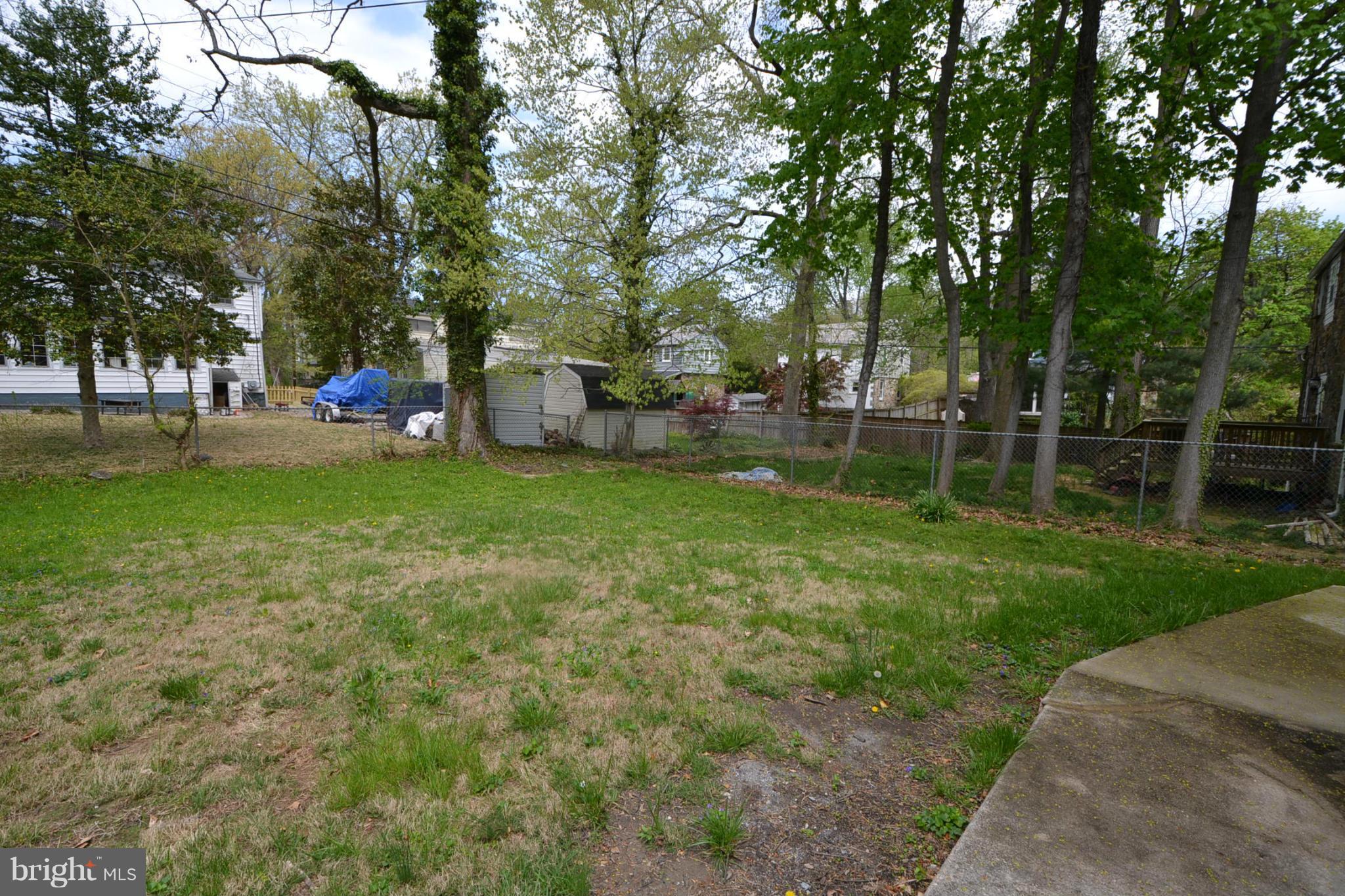 2504 Steele Road Baltimore, MD 21209 - Photo 9 of 21 a view of a park with large trees