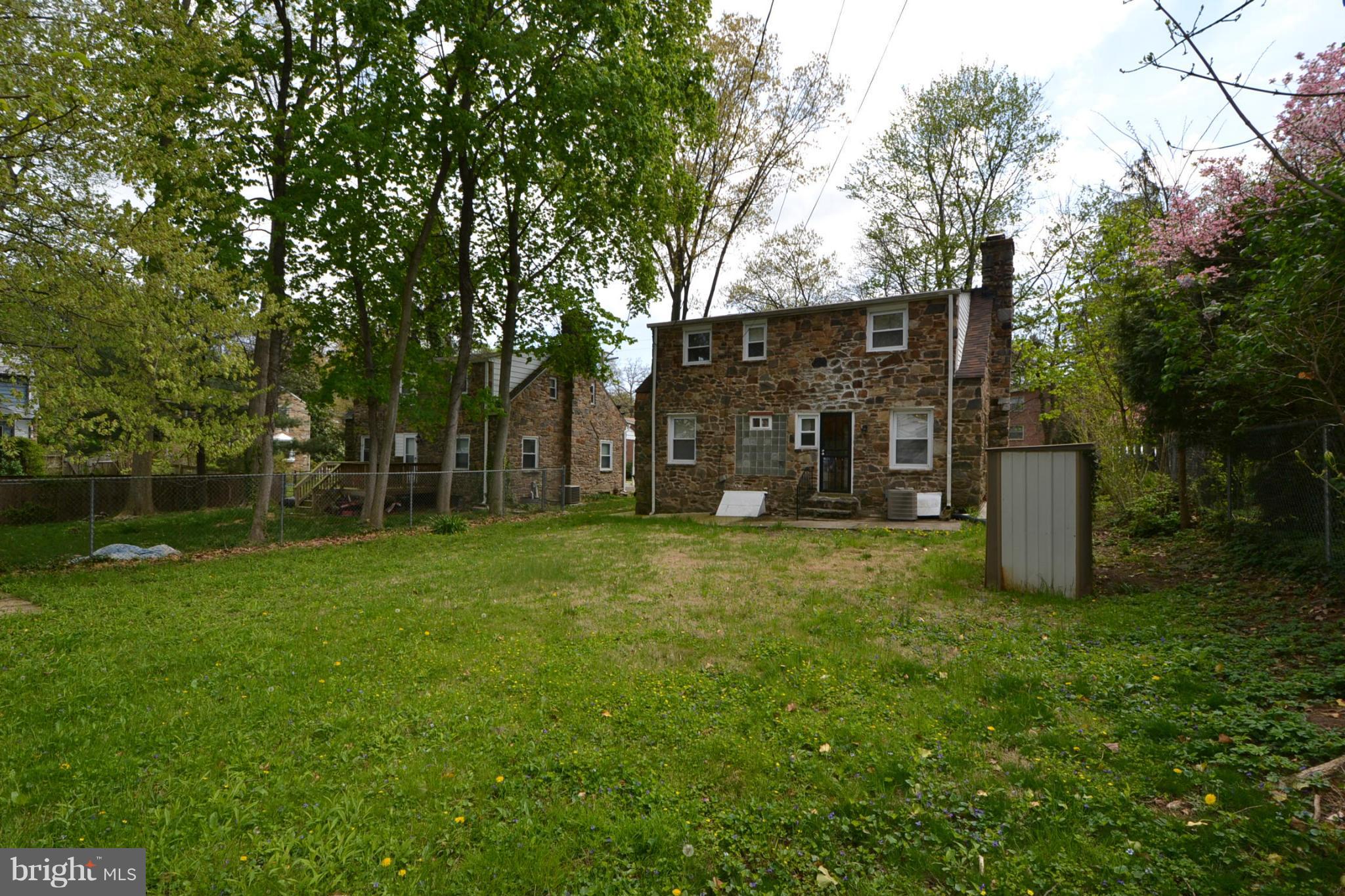 2504 Steele Road Baltimore, MD 21209 - Photo 10 of 21 a view of a house with a back yard