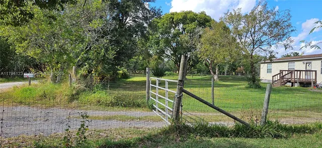 a view of a room that has a window in it
