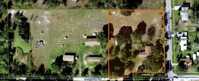 a swimming pool with outdoor seating and yard