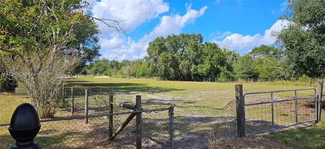a view of a room that has a window