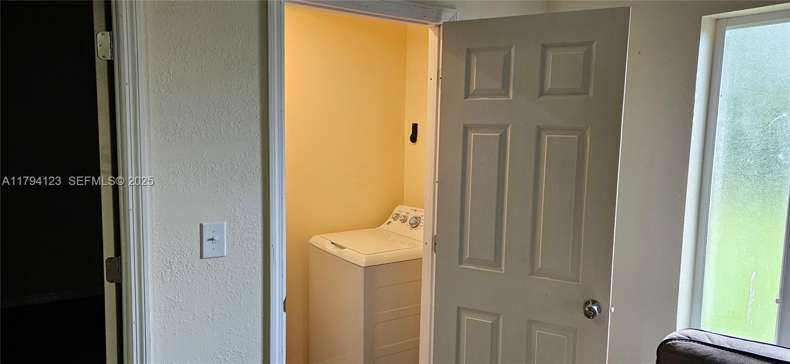 3100-3112 Sanders Road Davenport, FL 33837 - Photo 58 of 100 a bathroom with a window