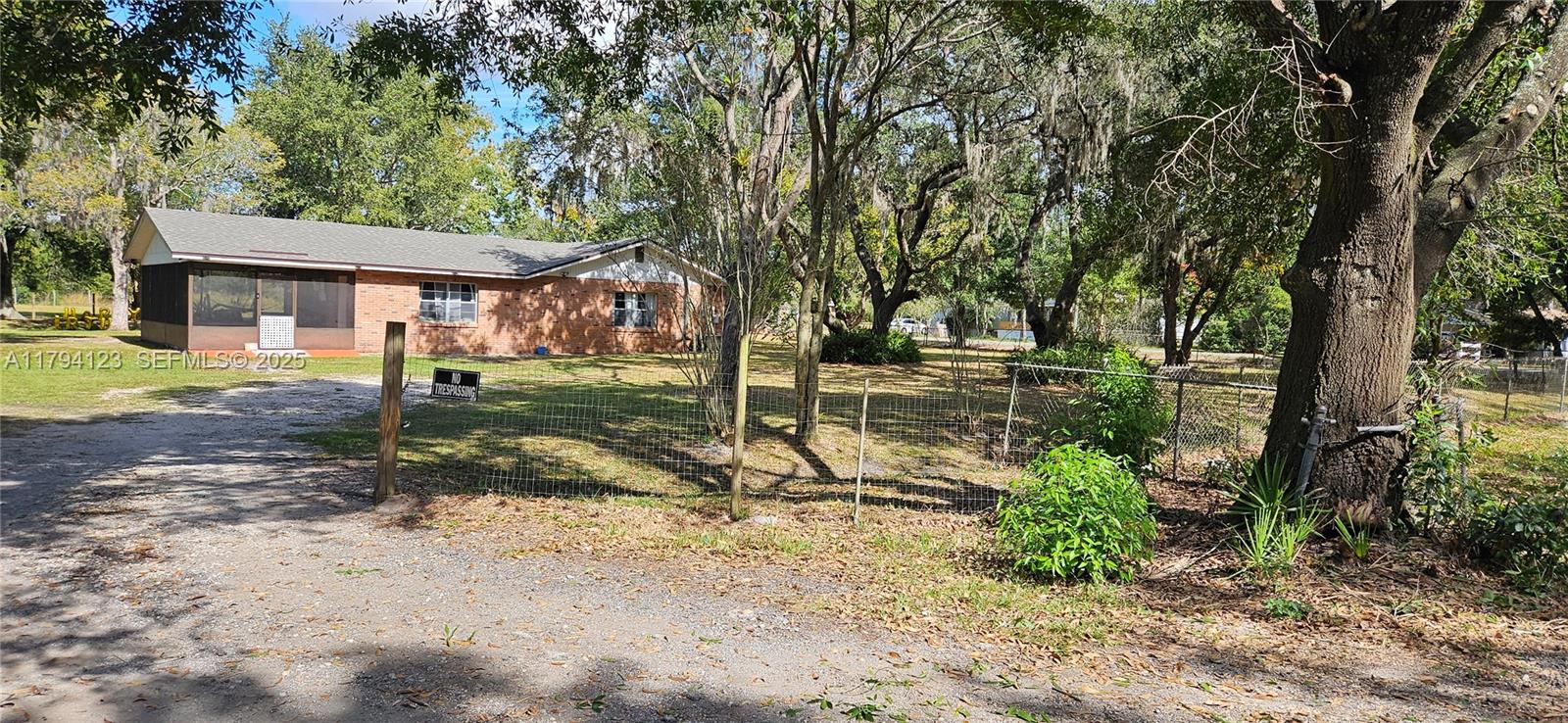 3100-3112 Sanders Road Davenport, FL 33837 - Photo 10 of 100 front view of a house with a yard