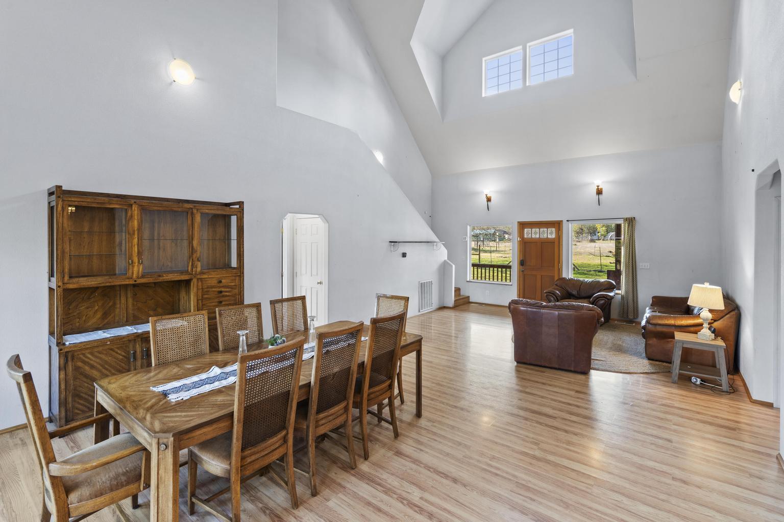 1190 Cedar Flat Road Williams, OR 97544 - Photo 7 of 45 a view of a dining room with furniture and wooden floor