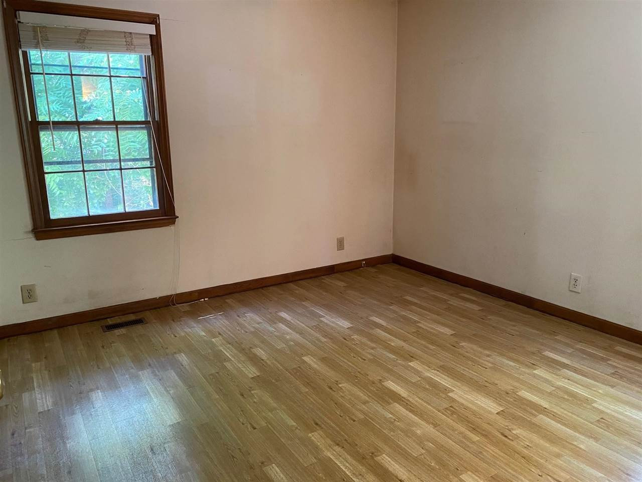 1400 Azalea Drive Raleigh, NC 27607 - Photo 5 of 12 There are two bedrooms on the main level and two on in the basement. Master Bedroom