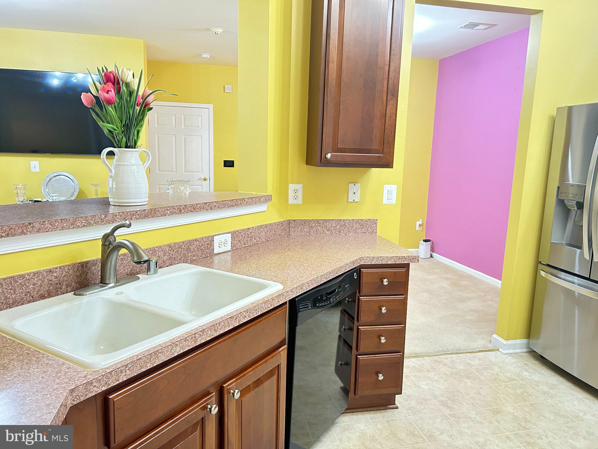 2001 Connor Court, Unit 704D Bowie, MD 20721 - Photo 21 of 33 Vibrant kitchen with modern charm.