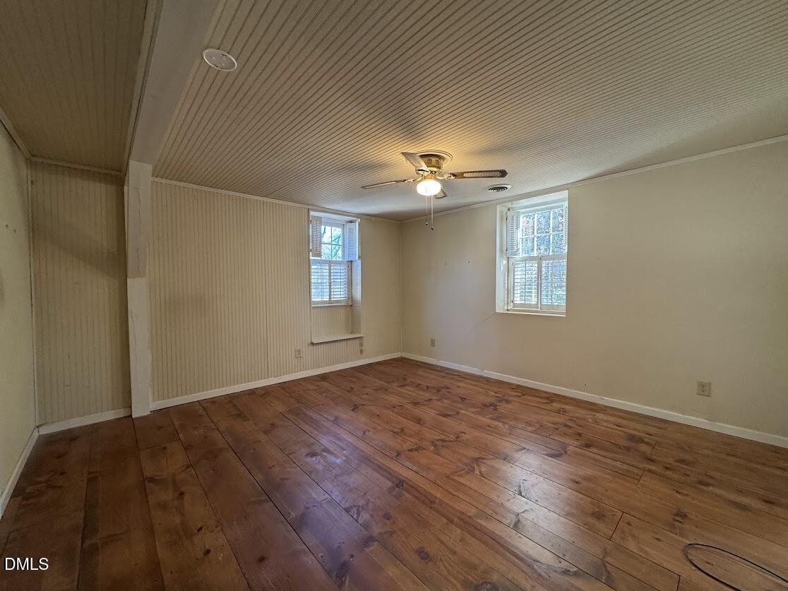 1134 Manchester Drive Cary, NC 27511 - Photo 14 of 15 a view of an empty room with a window