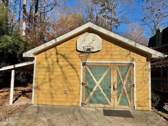 1134 Manchester Drive Cary, NC 27511 - Photo 4 of 15 a front view of a house with garden