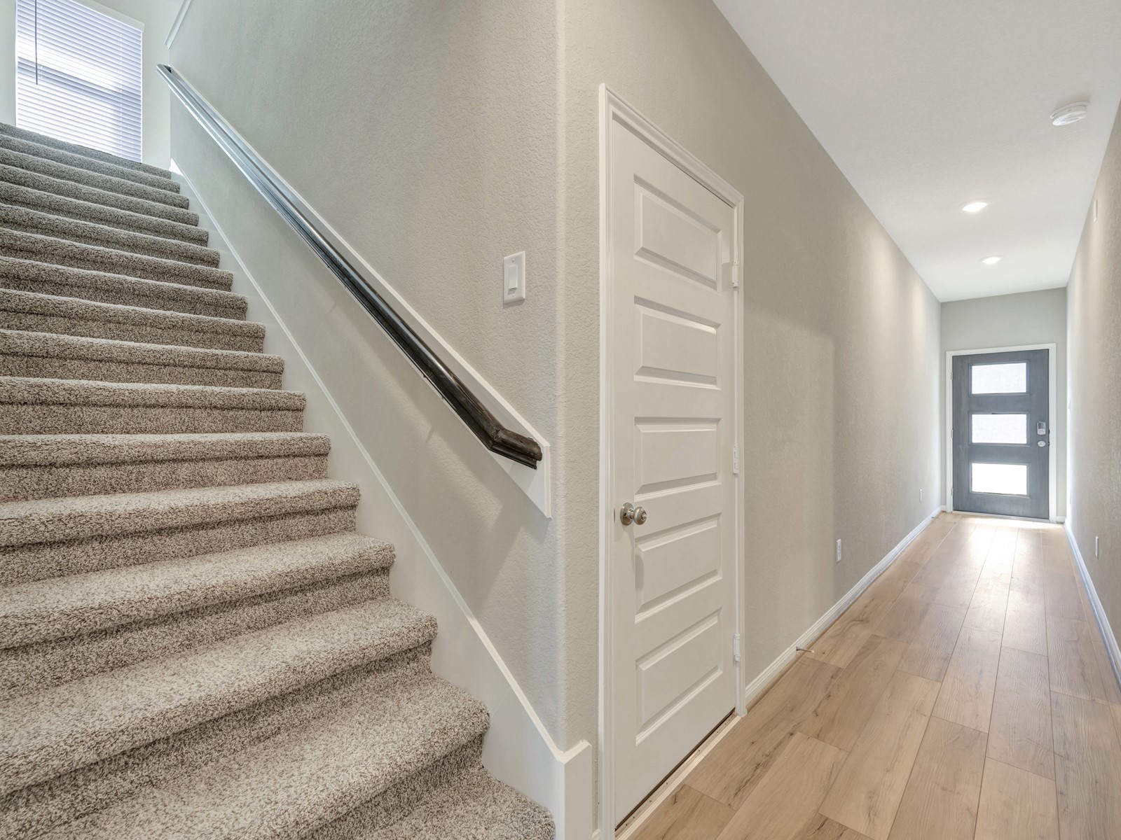 17882 Stone Terrace Montgomery, TX 77316 - Photo 16 of 33 a view of entryway and hall with wooden floor