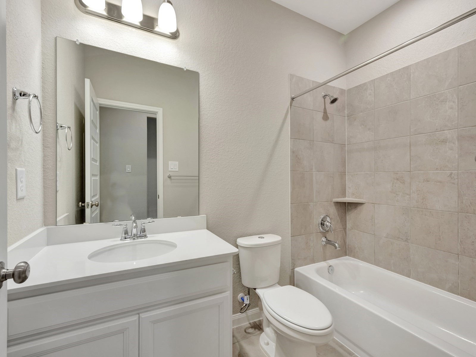 17882 Stone Terrace Montgomery, TX 77316 - Photo 29 of 33 a bathroom with a sink a toilet and a bathtub