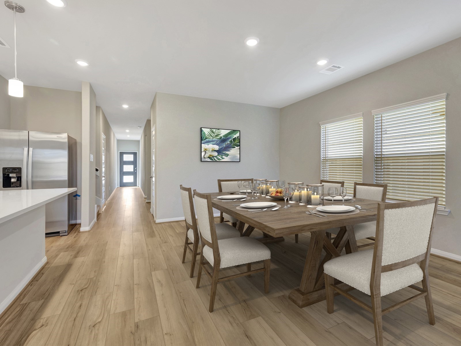17882 Stone Terrace Montgomery, TX 77316 - Photo 6 of 33 a view of a dining room with furniture and wooden floor